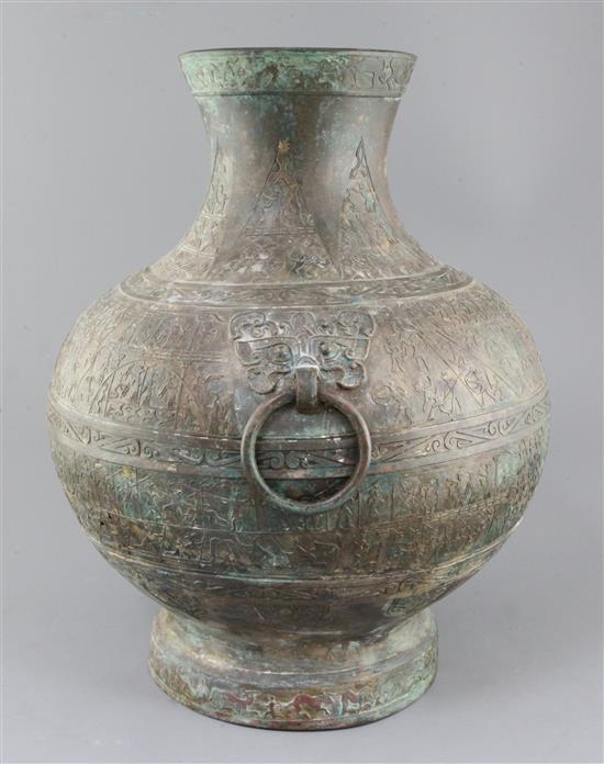 A rare and large Chinese archaic bronze ritual drinking vessel, Hu, Warring States period 5th-3rd century B.C., approx. 50cm high, repa